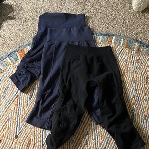 3 pairs of lululemon capri leggings, two navy blue one black